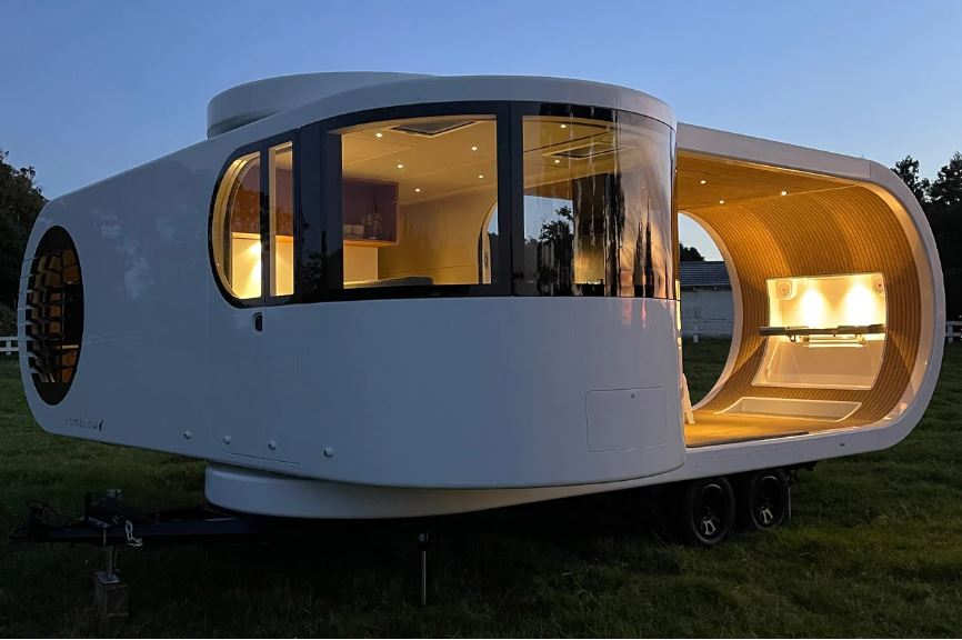 THIS TRAVEL TRAILER SWIVELS 90DEGREES TO TRANSFORM FROM CLOSED CABIN INTO OPEN LIVING TINY HOME - 10928
