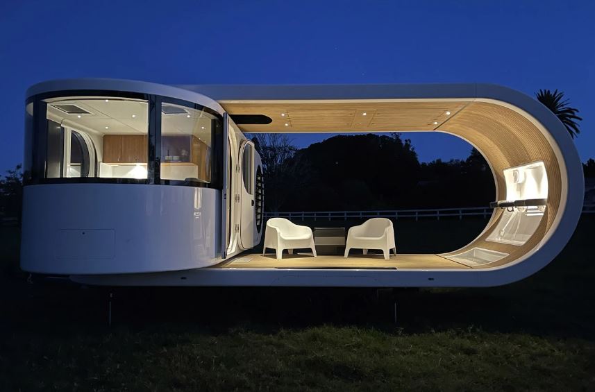 THIS TRAVEL TRAILER SWIVELS 90DEGREES TO TRANSFORM FROM CLOSED CABIN INTO OPEN LIVING TINY HOME - 10927